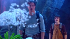 Trevor blows up some dandelion seeds in the widescreen 2-D version.