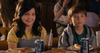 Maggie (Bailee Madison) and Michael (Griffin Gluck) negotiate the terms of their participation in Danny's fake family ruse over oddly untouched Pizza Hut.