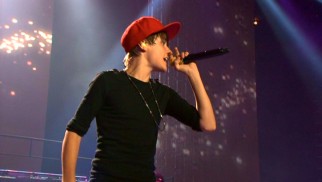 Justin Bieber returns on stage for the firework-backed, Ludacris-featuring finale "Baby."