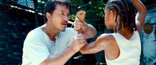 Mr. Han (Jackie Chan) is a handyman in more ways than one, as he instructs Dre with a firm grip.