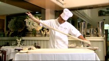 The executive pasta chef of Beverly Hills' Mr. Chow restaurant shows off his noodle-making skills.