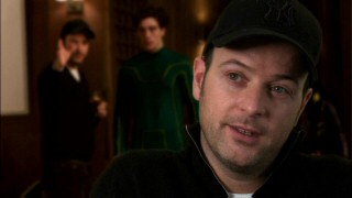 During the "Pushing Boundaries" segment of the Blu-ray's feature-length documentary, director Matthew Vaughn reveals how he came to the project via collaboration with comic writer Mark Millar.