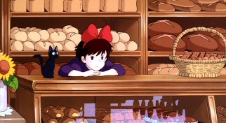 Not all of Kiki's time in Korinko is highly stimulating. She and Jiji fight boredom while watching Osono's bakery on a quiet stretch.