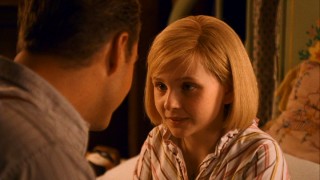 Kit gets some great Depression reassurances from her unemployed father (Chris O'Donnell).