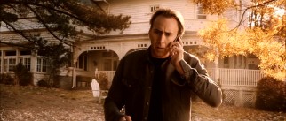 Nicolas Cage makes a cautionary cellular phone call to his pep-pep preacher in the golden glow of a warm October magic hour.
