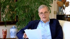 "2001: A Space Odyssey" star Keir Dullea puts on his glasses and reads us others' thoughts in the awkwardly-designed "What is Out There?"