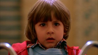 Danny's Big Wheel expedition through the Overlook comes to a halt upon unexpectedly seeing young twin sisters.