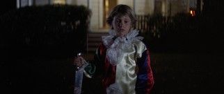 A 6-year-old Michael Myers (Will Sandin) brandishes his first murder weapon on Halloween 1963.