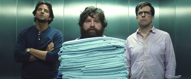 "The Hangover Part III" returns Phil (Bradley Cooper), Alan (Zach Galifianakis), and Stu (Ed Helms) to a Caesars Palace elevator, this time with a stack of towels.