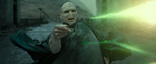 Avada Kedavra! Lord Voldemort (Ralph Fiennes) hits Harry with his best shot. Fire away!