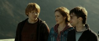 Oh, the places they've been: best friends Ron, Hermione, and Harry take a moment to let their adventures sink in.