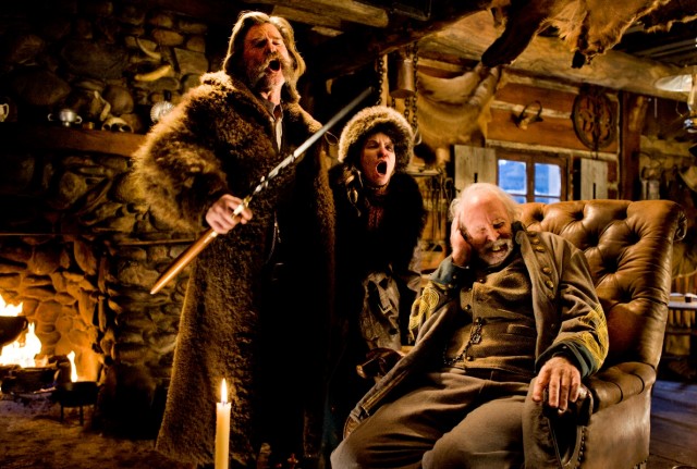 In Quentin Tarantino's "The Hateful Eight", bounty hunter John Ruth (Kurt Russell) loudly brings outlaw Daisy Domergue (Jennifer Jason Leigh) to Minnie's Haberdashery in Wyoming en route to the town of Red Rock.