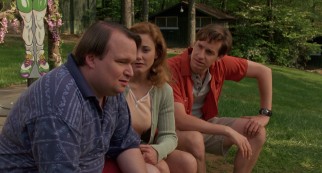 Staffers Pat (Tom McGowan), Julie (Leah Lail), and Tim (Paul Feig) do not like the new directions their fat camp is taking.