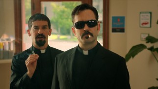 Writers/directors Robert Ben Garant and Thomas Lennon play the cigarette-smoking, sunglass-wearing priests from the Vatican.