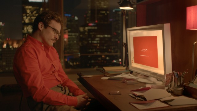 Theodore Twombly (Joaquin Phoenix) prepares to meet his new operating system in Spike Jonze's "Her."