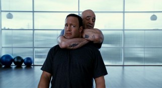 Scott Voss (Kevin James) isn't so sure about the training methods of his citizenship student Niko (Bas Rutten).