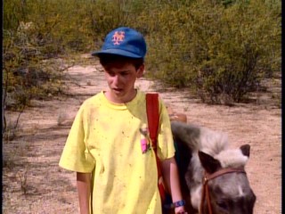 Young Mets fan Buddy Ernst (Josh Tygiel) runs away with his newly befriended pony Goldilocks.