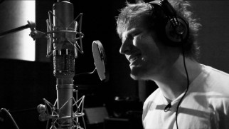 Ed Sheeran gets into his end credits song "I See Fire" in his black and white portions of its music video.