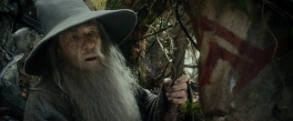 Gandalf (Ian McKellen) recognizes a symbol that gives him pause while out journeying with the dwarves and Bilbo.