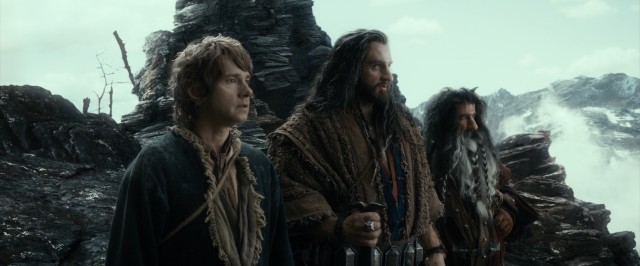 Bilbo Baggins (Martin Freeman), Thorin (Richard Armitage), and another dwarf take in the sights of their grand journey.