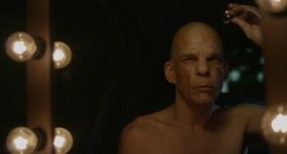 Mr. Oscar (Denis Lavant) makes himself over in dramatic ways for each of his assignments.