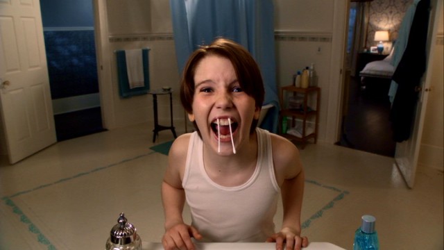 When parents are away, children will play in front of a bathroom mirror. Finn Baxter (Christian Martyn) shows he can handle aftershave better than Kevin McCallister, and also make use of Q-tip fangs in "Home Alone: The Holiday Heist."