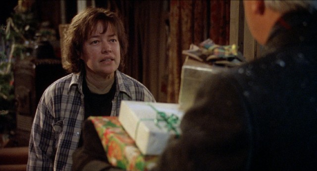 Even on Christmas Eve, Frances Lacey (Kathy Bates) holds steadfast to her resistance to charity, turning away a present-bearing Catholic priest who drops by.
