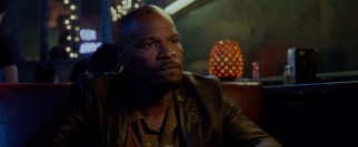 Jamie Foxx returns as Dean "MF" Jones, an ex-con who offers questionable advice and negotiation skills.