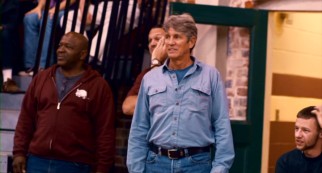 Postmaster Laurence Humphrey (Eric Roberts) shows up late, but likes what he sees in his wife's decisive basketball game.
