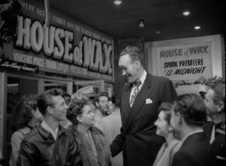 A giant in a good mood turns out for the midnight spook screening of House of Wax's Round-the-Clock premieres.