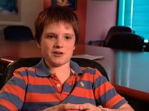 A very young Josh Hutcherson reveals the trick to recording lines with a full mouth.