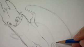 Gabe Hordos illustrates "How to Draw a Dragon" in his Toothless tutorial.
