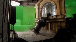 Green screen, a facade, and a scale train are used to create an exciting nightmare sequence.