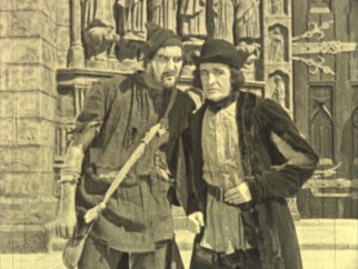 King of beggars Clopin (Ernest Torrence) is in cahoots with the film's villain, Jehan (Brandon Hurst).