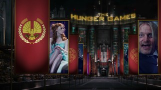 Disc 1's ornate menu scene has Foxface looking over at a goofy Haymitch in City Circle banners displaying narrow clips.