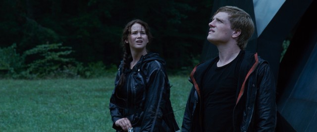 District 12 tributes Katniss Everdeen (Jennifer Lawrence) and Peeta Mellark (Josh Hutcherson) stick together in the 74th Hunger Games.