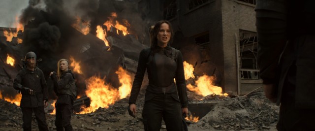 Katniss Everdeen (Jennifer Lawrence) cannot hide her anger after witnessing first-hand the destruction brought on by explosions.