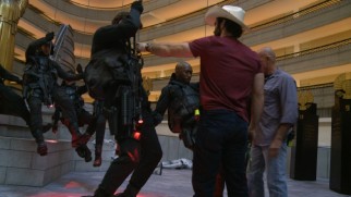 "The Mockingjay Lives" gives us a behind-the-scenes look at Katniss and company's wire stunt.