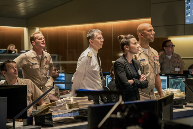 Gary Oldman, Linda Cardellini, and Common put on their best concerned faces as the government figures observing the USS Arkansas' actions from afar.