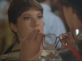 Without her glasses on, Melissa becomes beautiful!