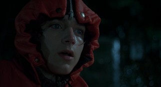 Mikey Carver (Elijah Wood) goes outside to get a better look at the titular ice storm and to enjoy breathing its clean molecules.