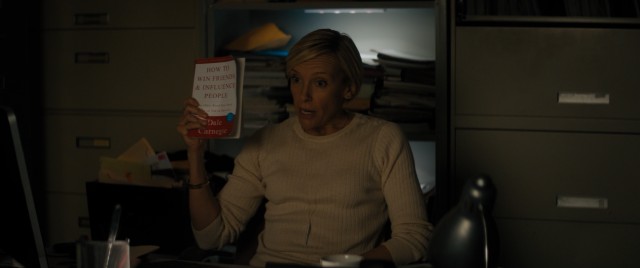 Nate's gum-chewing supervisor at the FBI (Toni Collette) recommends "How to Win Friends and Influence People" as part of his undercover assignment.