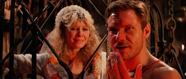 A supposedly brainwashed Indiana Jones (Harrison Ford) prepares to punish the whiney Willie Scott (Kate Capshaw) in "Indiana Jones and the Temple of Doom."