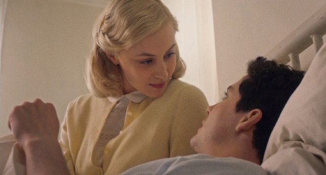 Olivia (Sarah Gadon) visits Marcus (Logan Lerman) in the hospital.