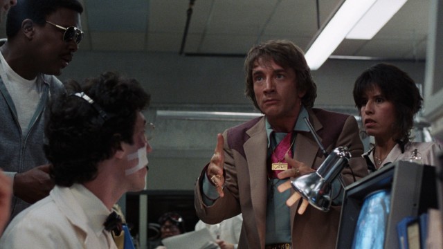 In "Innerspace", grocery store cashier Jack Putter (Martin Short) has a shrunken man injected in him.