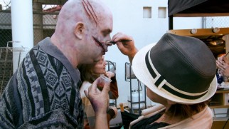 A ghoul has his ghastly make-up touched up in "Ghostly Transformations."