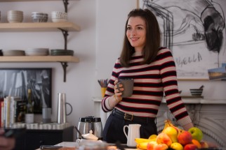 Anne Hathaway tries to juggle work and family as busy business owner Jules Ostin.