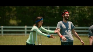 Cobie Smulders shares a laugh with Ben Schwartz in the Tegan and Sara "Fade Out" music video.