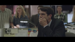 Timothy Simons tries to cover up his laughter in the gag reel.