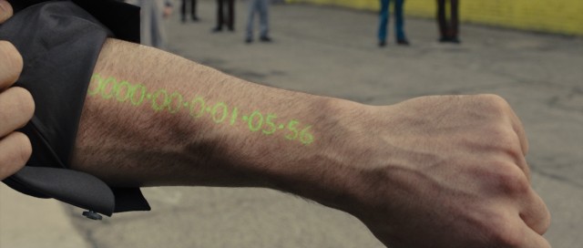 In "In Time", time is money and people wear their always-decreasing bank account balance on their forearm.